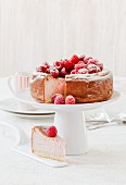 Raspberry cheesecake on a cake stand
