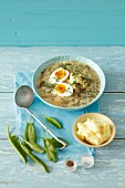 Sorrel soup with mashed potatoes and hard-boiled egg
