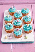 Blue cupcakes with mascarpone frosting and chocolate eggs