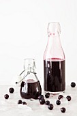 Blackcurrant and vanilla syrup in bottles