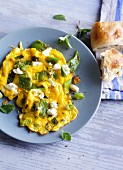 Scrambled eggs with beans and feta cheese