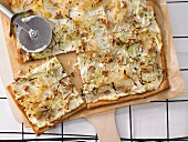 Tarte flambée with cabbage and walnuts