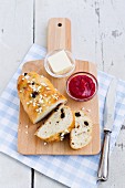 Raisin bread with sugar nibs and jam