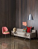 Living room with dark wood panelling on walls