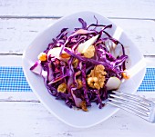 Red cabbage and apple salad with walnuts