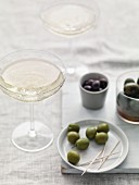 Assorted olives and sparkling wine