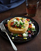 A potato cake with vegetables