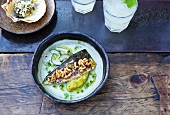 Grilled mackerel with yellow vegetable cream and cucumber salad