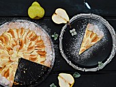 Sliced pear & cream cheese cake dusted with icing sugar