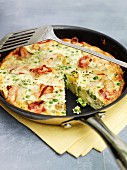 Bacon frittata in a frying pan