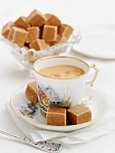 Cubes of fudge served with tea