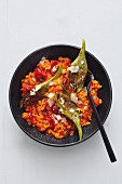 Risotto with tomatoes, pepper and artichokes