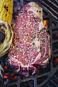 Marinated rib-eye steak on the barbecue