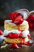 A shortbread cake with strawberries and cream