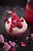 A cupcake with raspberries for Valentine's Day