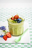 Vegan overnight oats with matcha, coconut milk, chia seeds and berries