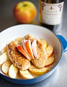 Chicken breast with Calvados on apple wedges