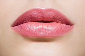 Lips wearing pink lipstick