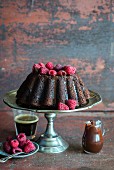 Moist chocolate cake with ganache and fresh raspberries