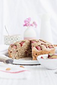 Rhubarb cake with almonds, sliced