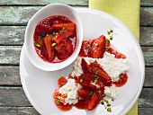 Strawberry ragout on a bed of creamed rice with chopped pistachios