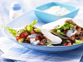 Pitta bread with turkey, vegetables and tzatziki