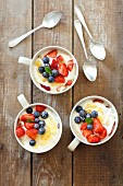 Yoghurt desserts with lemon curd and berries