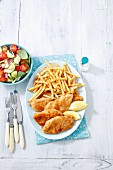 Chicken escalope with chips and salad