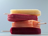 Four different fruit ice lollies (close-up)