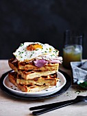 Polenta & cheese waffles with ham and fried eg