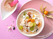 Sea buckthorn and quark muesli with grapes and physalis