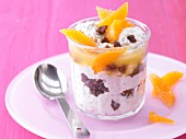 Fresh grain and fig muesli with soured milk and orange fillets