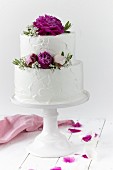 A wedding cake with spring roses