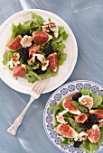 Rocket salad with figs, blackberries, goats' cheese, walnuts and prosciutto