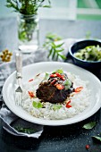 Marinated beef cheeks with chilli on a bed of rice