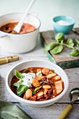 Bean stew with basil and sour cream