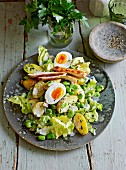 A summery potato & bean salad with chicken and egg