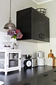 Modern kitchen in black with vintage accessories