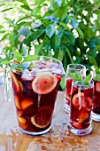 Sangria in a pitcher and in glasses