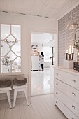 View from hallway into kitchen through lattice window