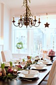 Table festively set with Christmas decorations