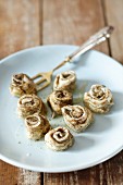 Herring rolls with herbs and black pepper