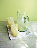Lemonade in a carafe with two glasses
