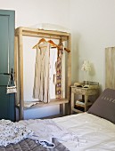 Open clothes rack in Mediterranean bedroom