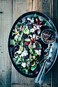 Leaf salad with blueberries, blackberries, beetroot, edible flowers, roasted almonds and red wine vinegar & onion vinaigrette