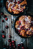 Bread pudding made of croissants with cranberries and sugar
