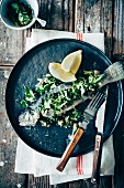 Poached trout with fresh lemon, capers and salsa verde
