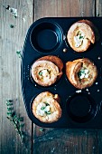 Popovers (filled Yorkshire puddings) with goats' cheese with fresh thyme