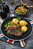 Grilled pork collar steak with new potatoes