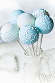 Wedding cake pops decorated in blue and white